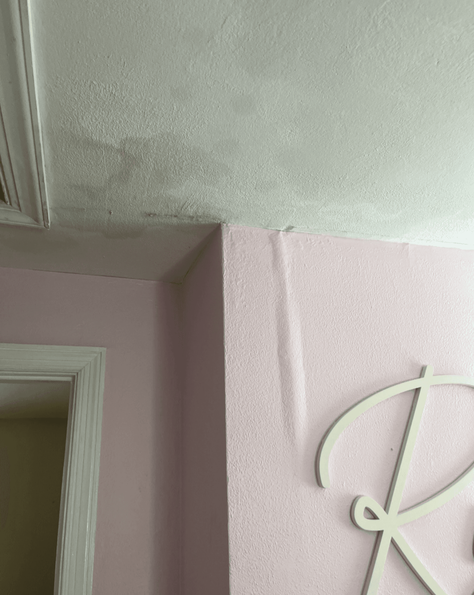 Water damage to nursery ceiling and walls from Six HVAC installation — stains visible in children's room